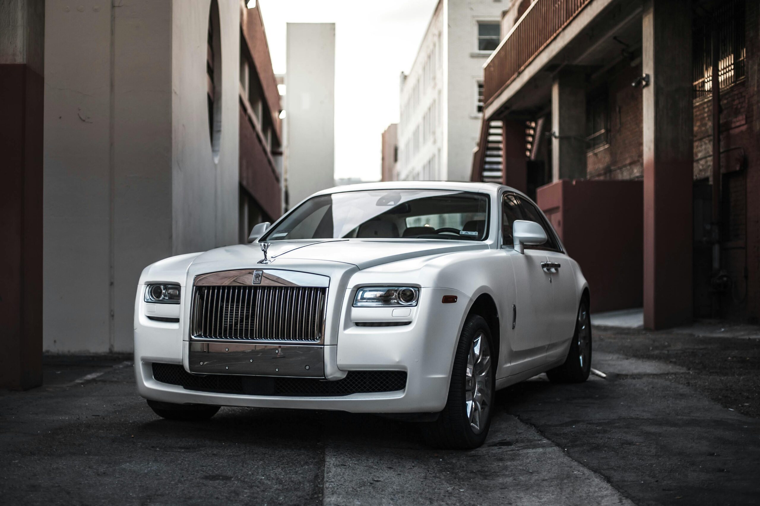 Used car buyer comparing vehicle options